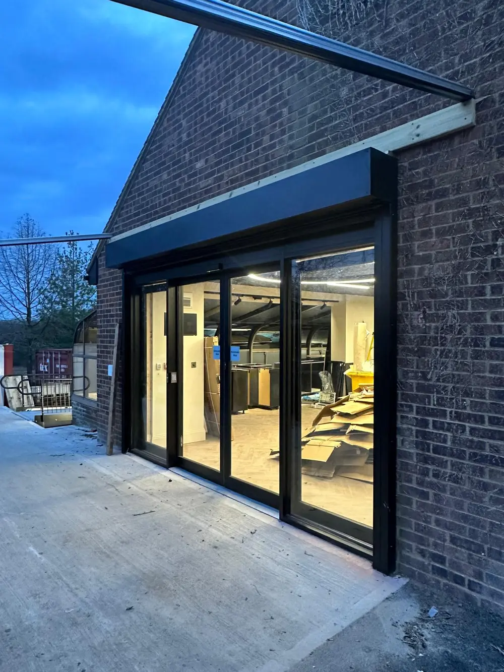Automatic sliding glass entrance doors installed at a new London store
