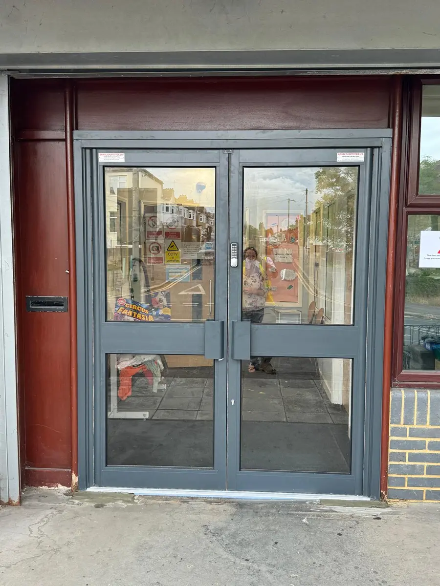Glazed aluminium commercial double doors fitted to a London shopfront by Range Shop Fronts