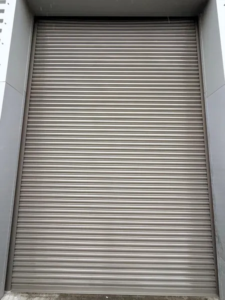 Solid industrial roller shutter installed for Fortes Interiors in London by Range Shop Fronts