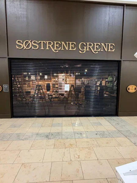 Perforated security roller shutter installed for the Søstrene Grene store in London by Range Shop Fronts