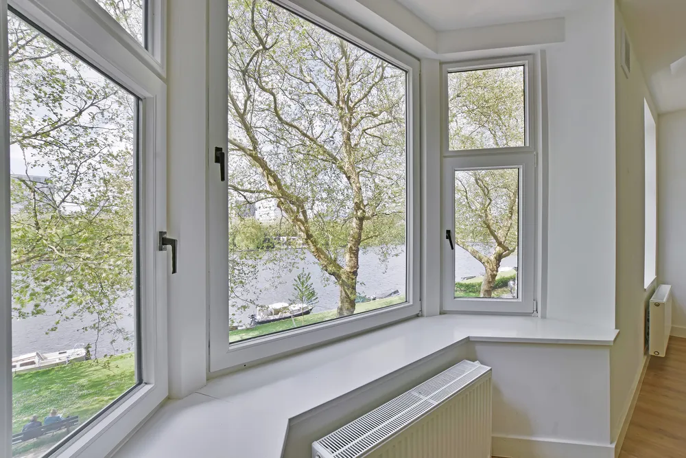 Arched aluminium casement windows in a period property
