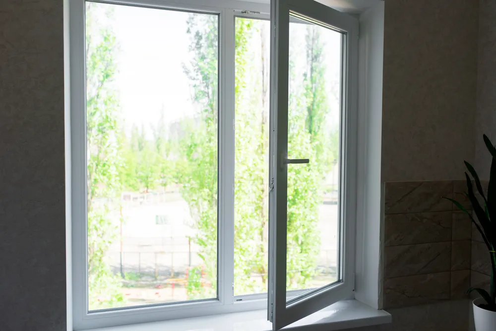 Aluminium tilt and turn window open for ventilation